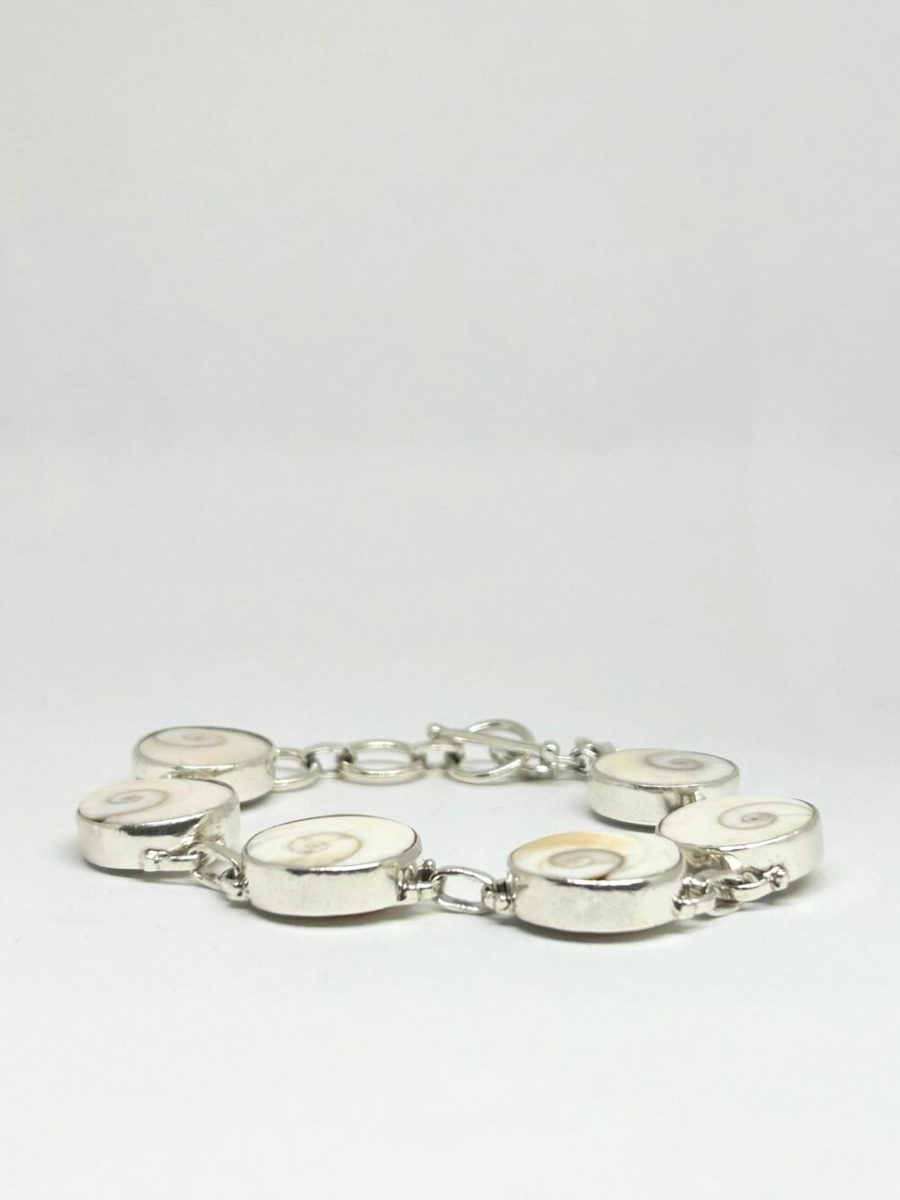 Gomti Chakra Silver Bracelet